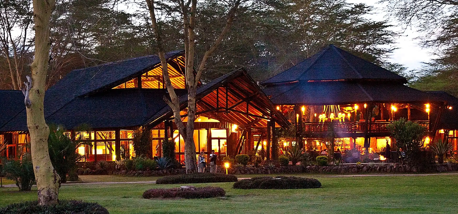 Ol Tukai Lodge main building lit at night, Amboseli